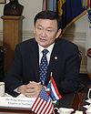 https://upload.wikimedia.org/wikipedia/commons/thumb/2/29/Thaksin_DOD_20050915.jpg/100px-Thaksin_DOD_20050915.jpg